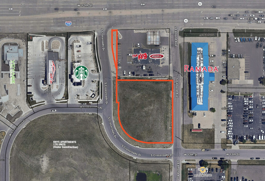Parcel boundary of the Crossroads Development land for sale wrapping S Crossroads Drive, south of The Keg and Pantry and west of S Edmond Avenue