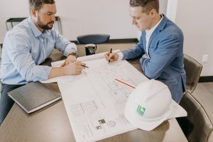 Construction and development team working on plans