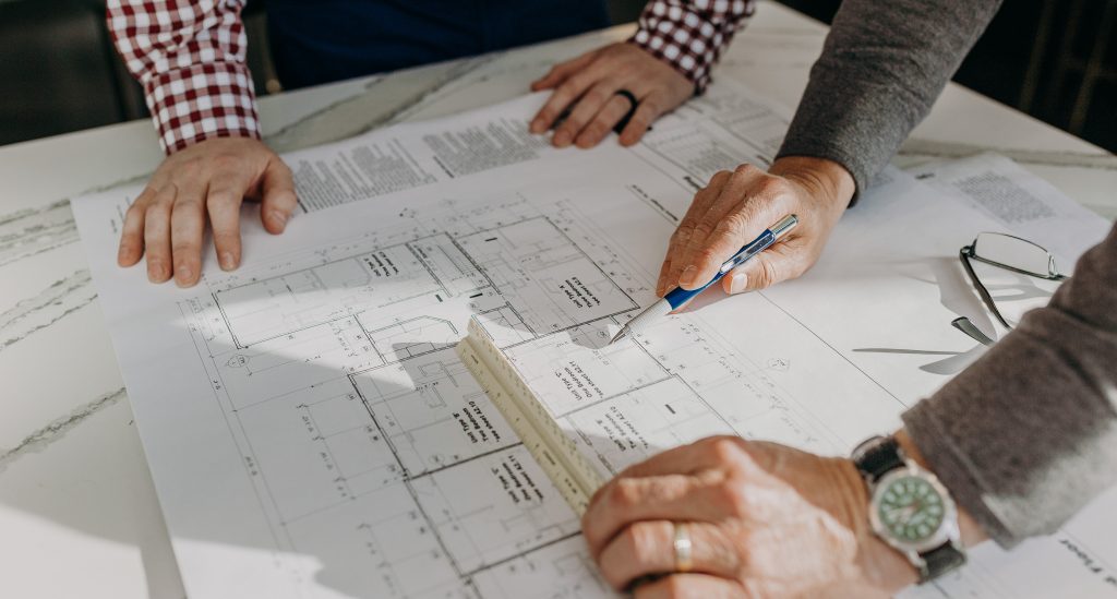 Lloyd Development and Construction team working through blueprints
