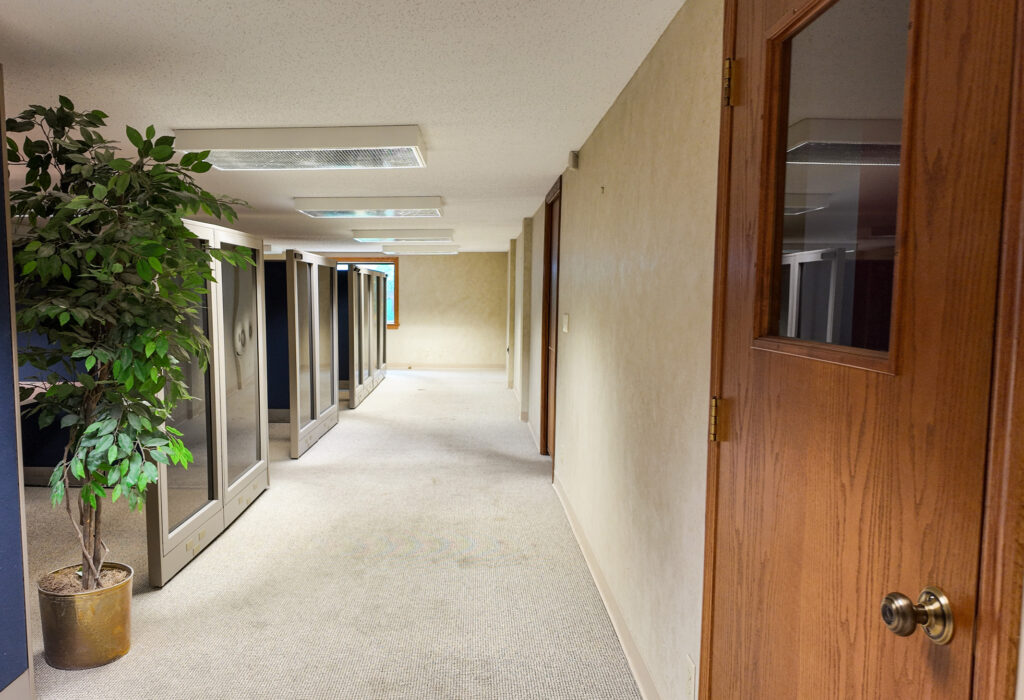 Interior hallway connecting work areas in the lower-level office suite