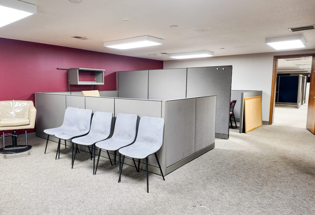 Open work area with modular office cubicles and seating
