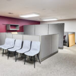 Open work area with modular office cubicles and seating