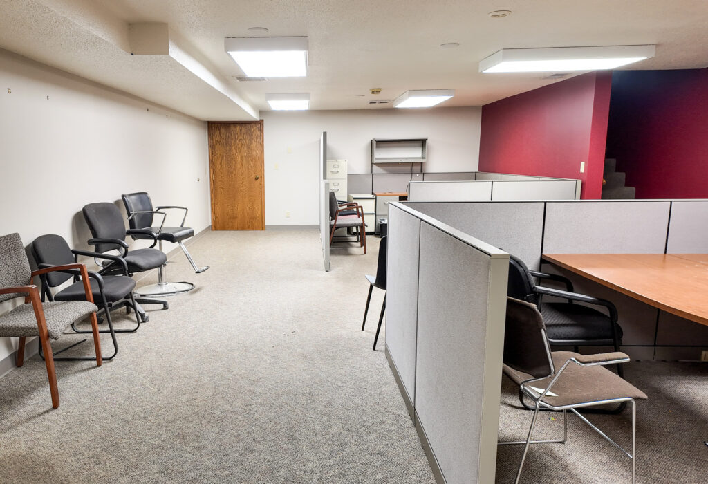 Open office area with modular workstations at the 41st Street office building