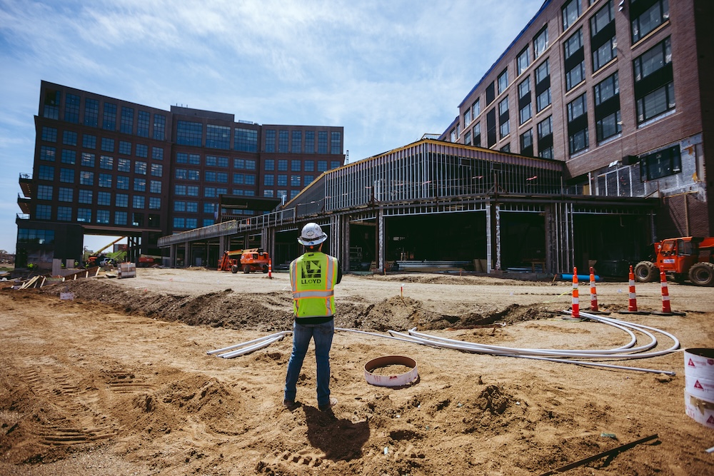 Man standing at The Steel District construction site 