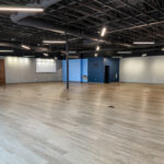 Open retail space with storefront windows at Empire Place Suite 4125