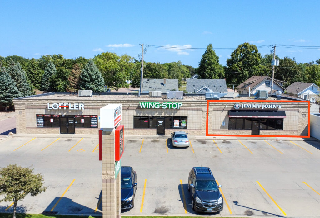 Aerial view of retail strip with available endcap suite along Minnesota Avenue