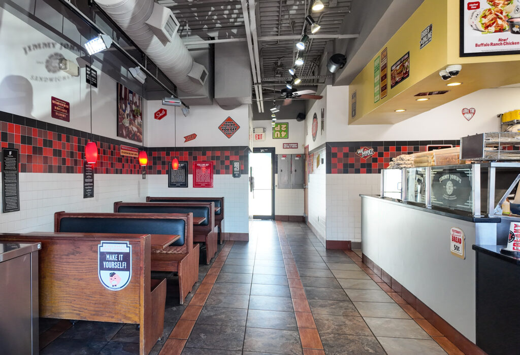 Commercial food preparation area with sinks and kitchen equipment