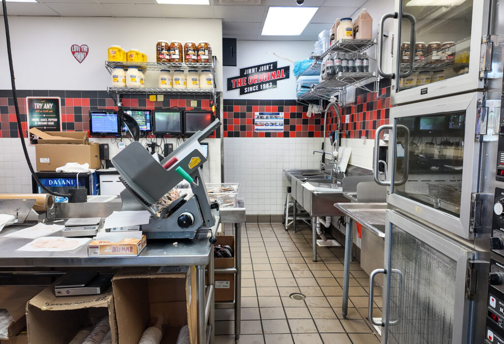 Restaurant interior showing dining area and customer service counter