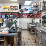 Restaurant interior showing dining area and customer service counter