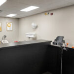Flexible-use room with built-in counter and open floor area