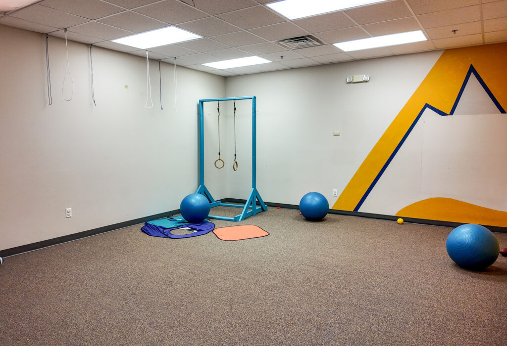 Additional view of carpeted flexible-use room with open floor space