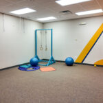 Additional view of carpeted flexible-use room with open floor space
