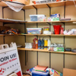 Storage closet with built-in wall shelving