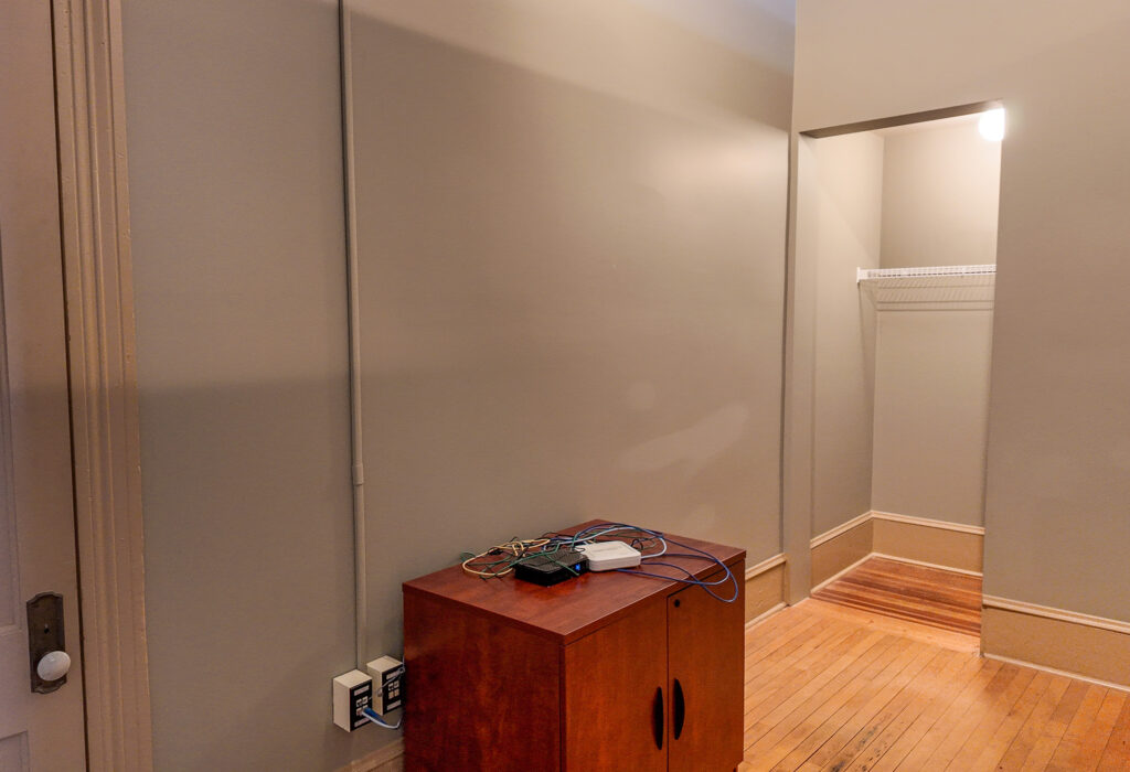 Office storage area with hardwood flooring