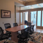 Conference space facing two private offices