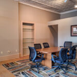 Open workspace with hardwood floors and historic architectural details