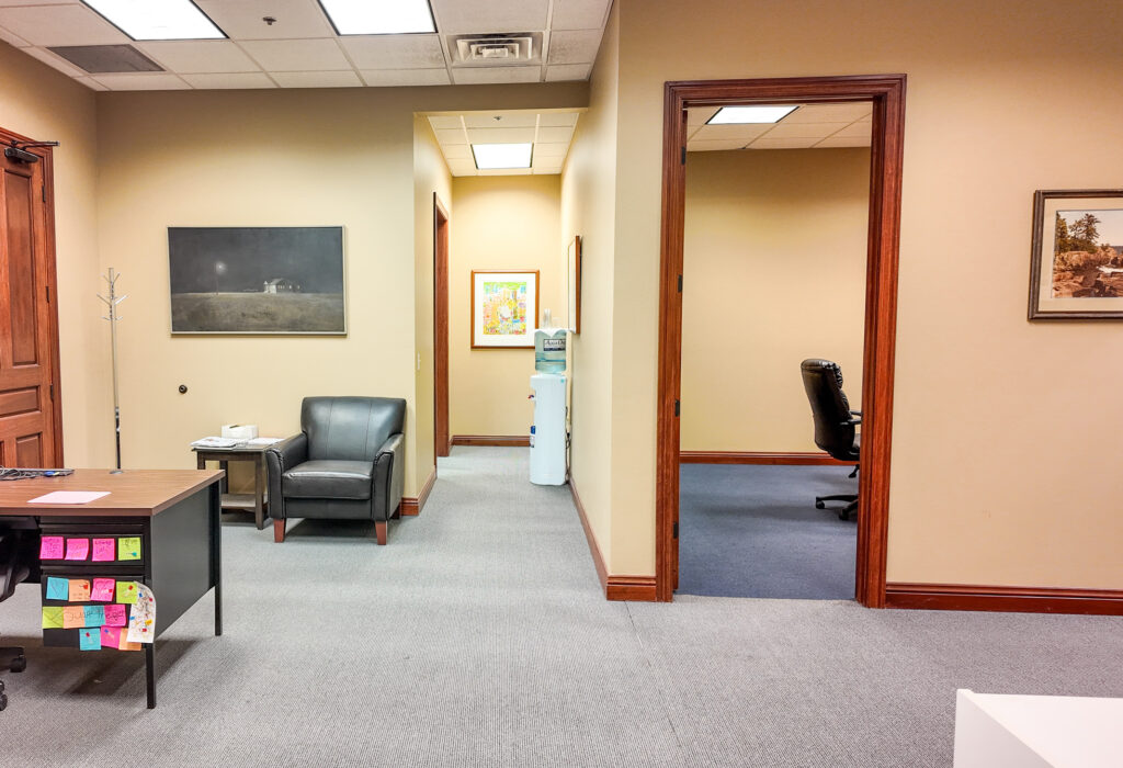 Open work area leading to conference and break room