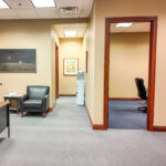 Open work area leading to conference and break room