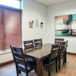 Break room with conference table and exterior window