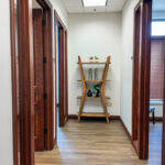 Interior hallway connecting private offices