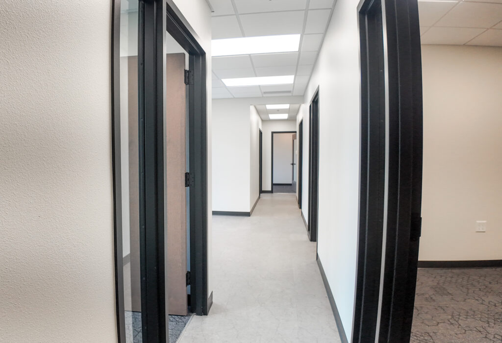 Interior hallway connecting private offices throughout Suite 120