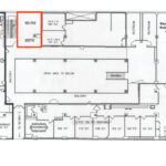 Second-floor plan with Suite 203 highlighted, showing the 345 SF +/- open area off the common corridor