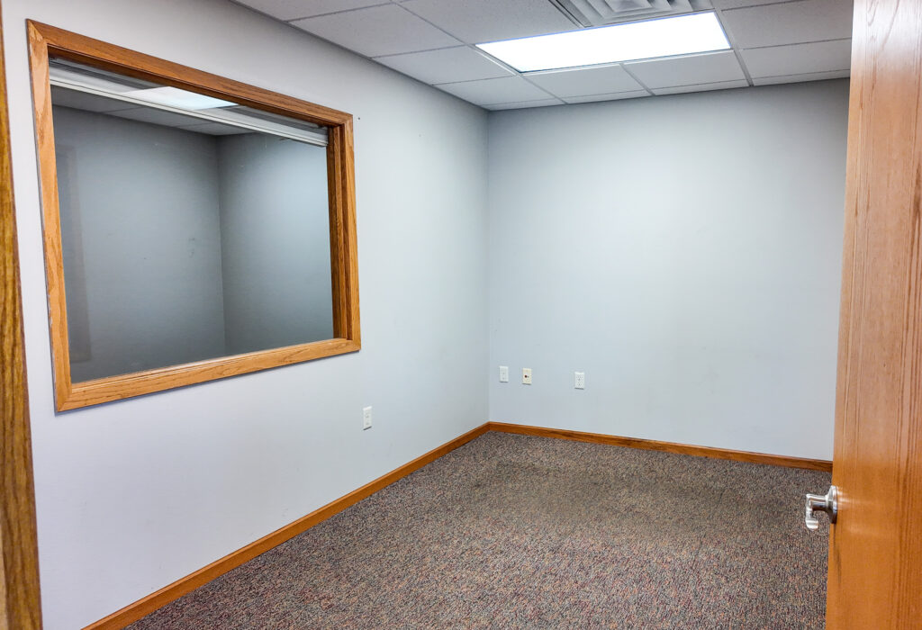 Private office with interior window at West 12th Street flex building