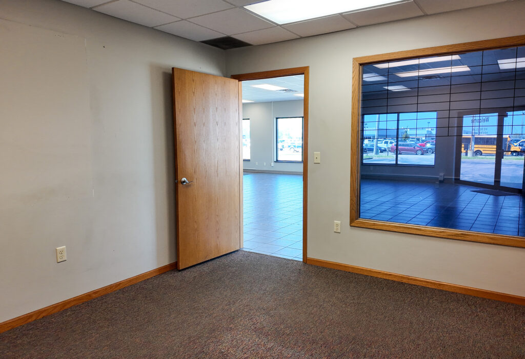 Private office overlooking the open showroom area