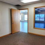 Private office overlooking the open showroom area