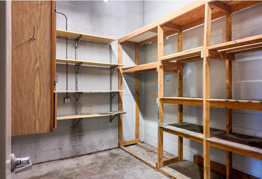 Shop storage room with built-in shelving