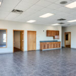 Commercial flex space with private offices and open showroom