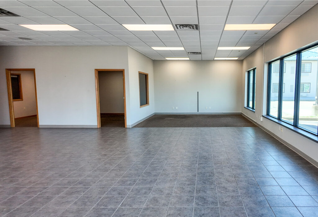 Open office and retail space with large storefront windows