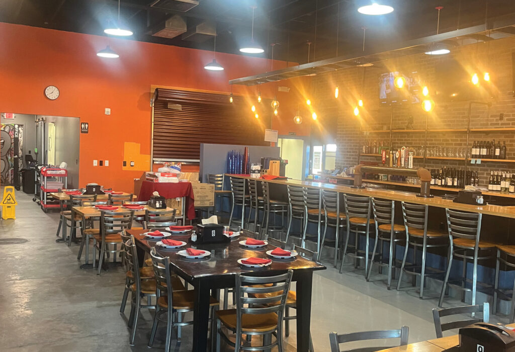 Restaurant dining area with booth and table seating
